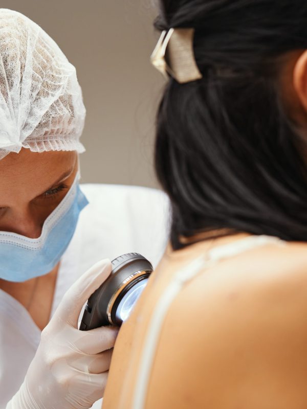 A dermatologist examines the skin. High quality photo